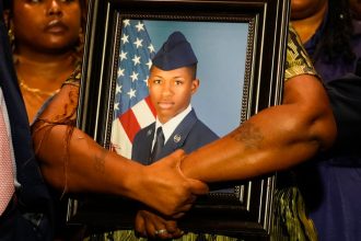 Family sues over Florida deputy’s killing of US airman