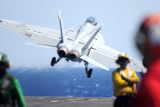 Jet landing on USS Truman goes overboard, forcing pilots to eject