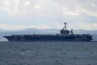 Pentagon keeps 2 aircraft carriers in Middle East for another week