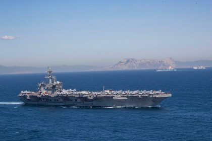 Iran puts ‘fingers on trigger’ as US armada arrives in Middle East