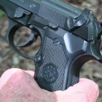 Beretta 92 FS Suppressed Close-up