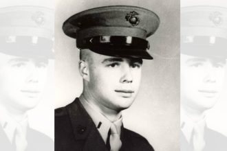 Refusing evacuation, this Marine packed dirt into his wound and continued to fight
