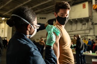 In shift, Pentagon grants flu vaccine exceptions to military services, some federal agencies
