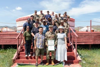 He left Mongolia to pursue higher education. He returned as a US soldier.