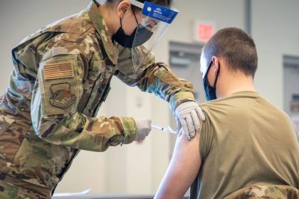 Trump promised redemption for troops who refused COVID shots. A year later, many are still waiting.