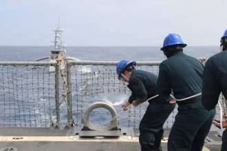 US destroyer practices at-sea drone refueling